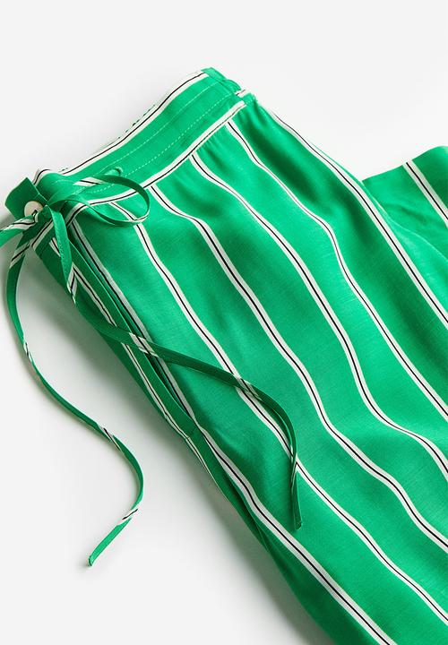 H&M - Patterned trousers - bright green striped