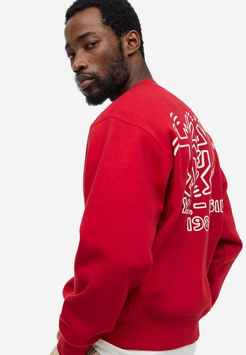 H&M - Oversized fit printed sweatshirt - red keith haring 