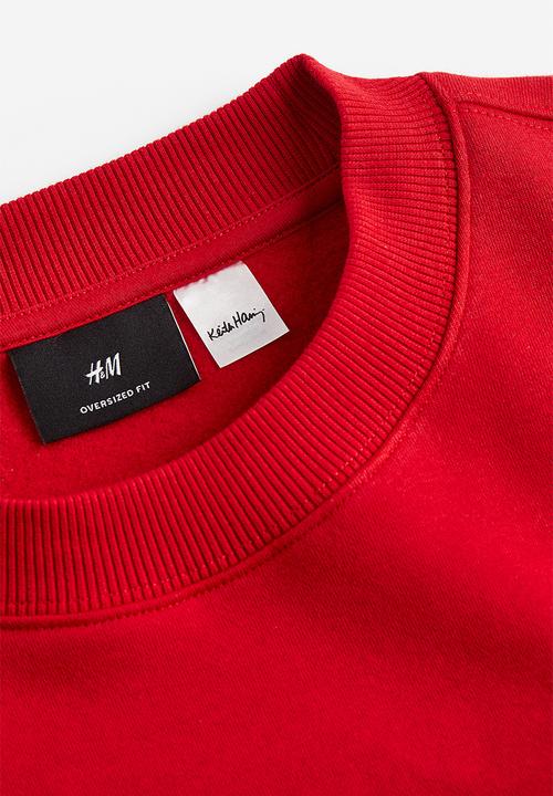 H&M - Oversized fit printed sweatshirt - red keith haring 