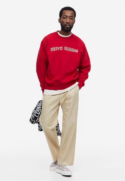 H&M - Oversized fit printed sweatshirt - red keith haring 