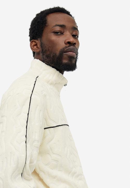 H&M - Relaxed fit terry track jacket - cream keith haring 