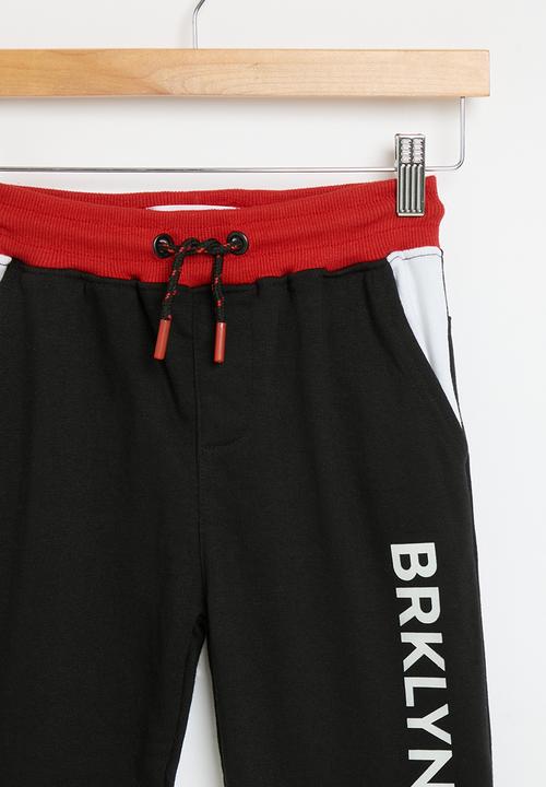 MINOTI - Fleece jogger - black 