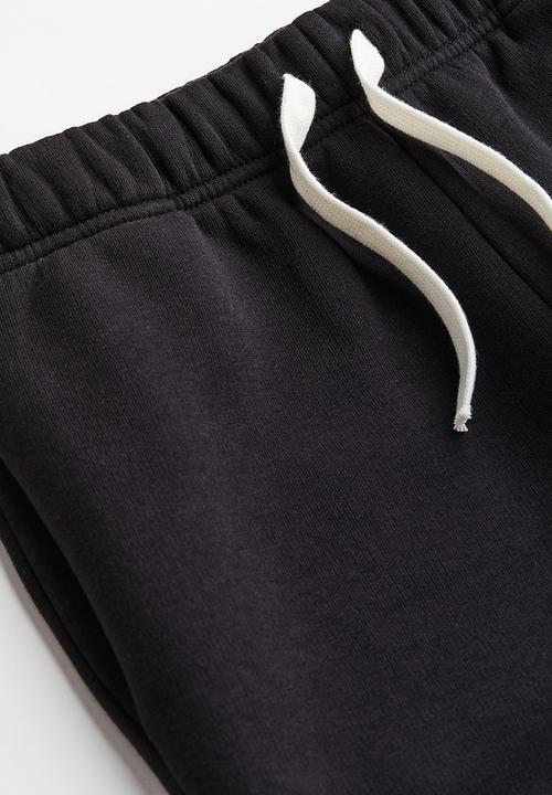 H&M - Loose fit joggers - black