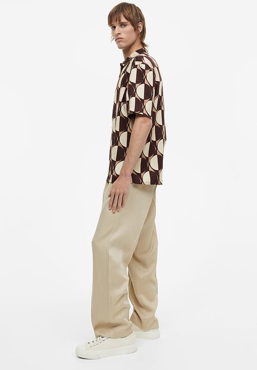 H&M - Regular fit short-sleeved lyocell shirt - dark brown patterned