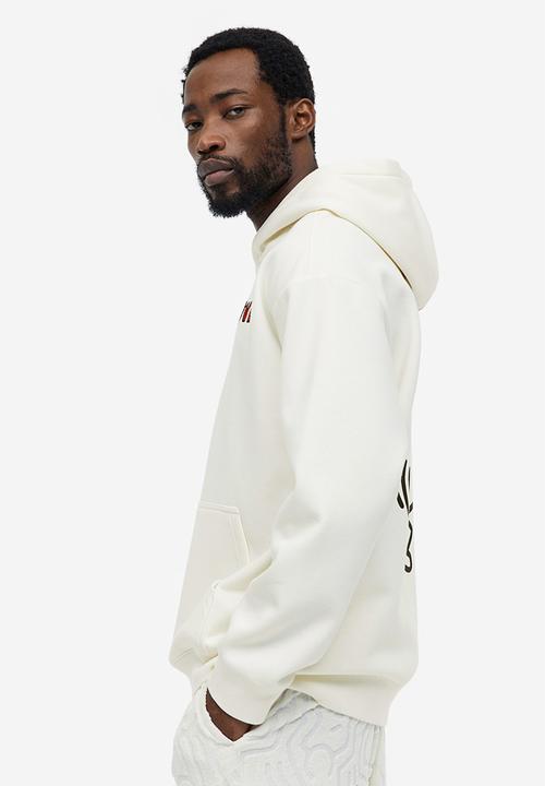 H&M - Relaxed fit hoodie - cream keith haring