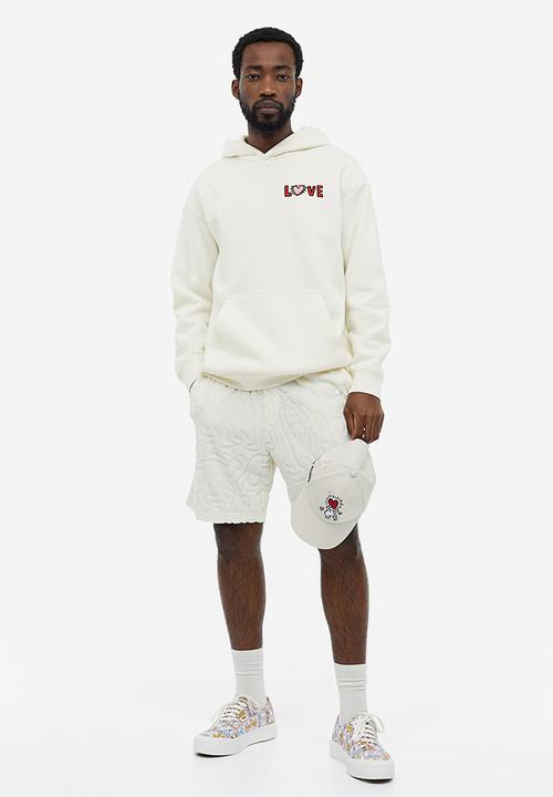 H&M - Relaxed fit hoodie - cream keith haring