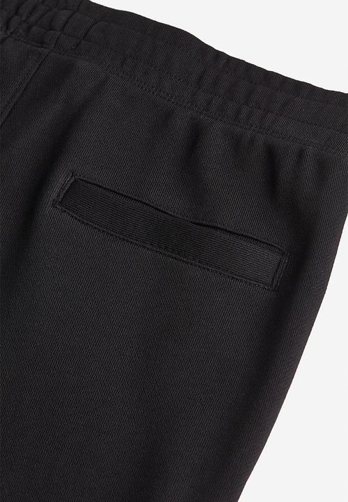 H&M - Relaxed fit printed sweatshorts - black,multi