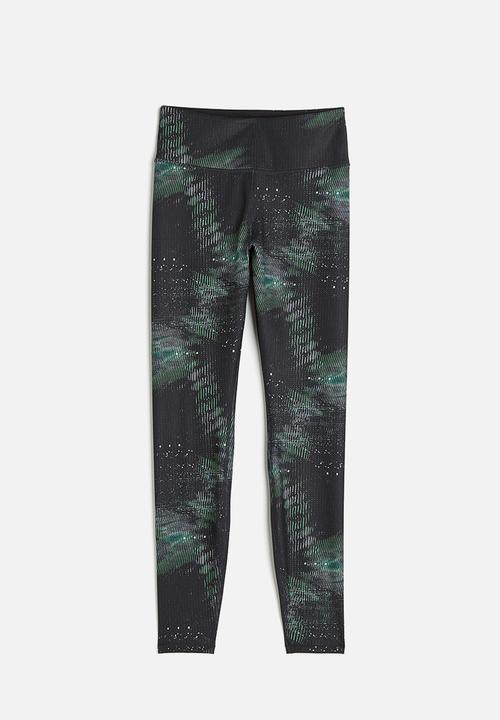 H&M - High waist sports tights - black/patterned