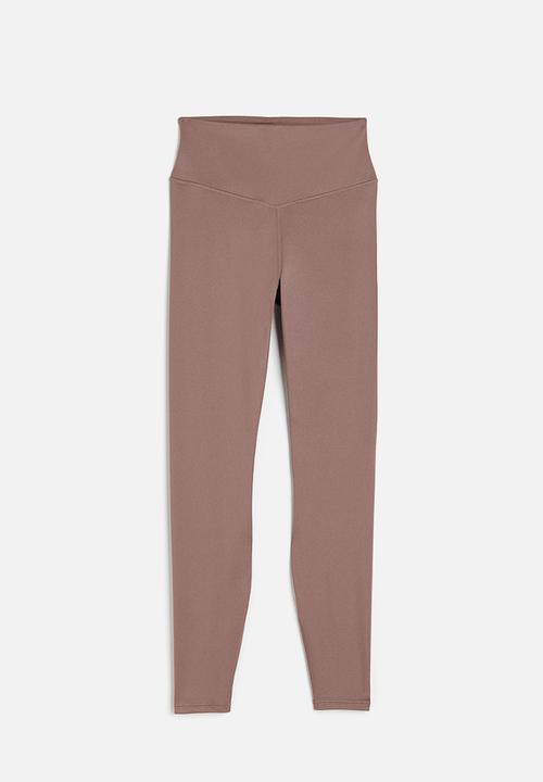 H&M - Softmove™ sports tights - beige