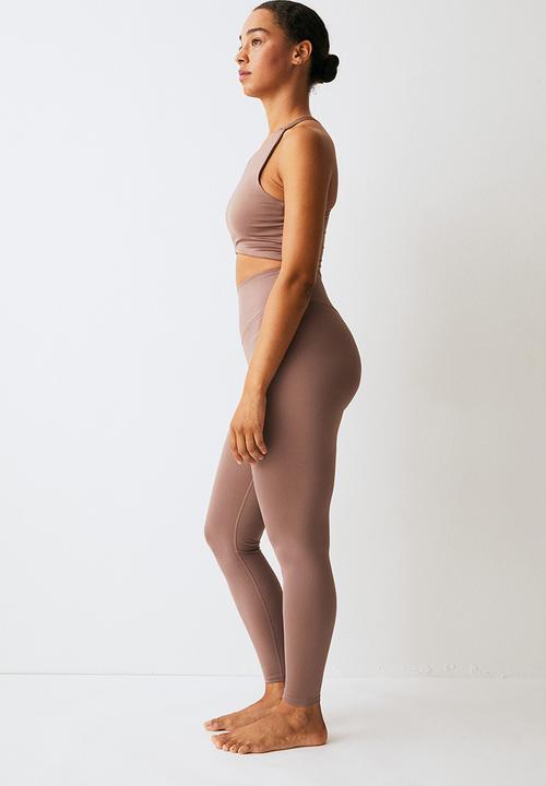 H&M - Softmove™ sports tights - beige