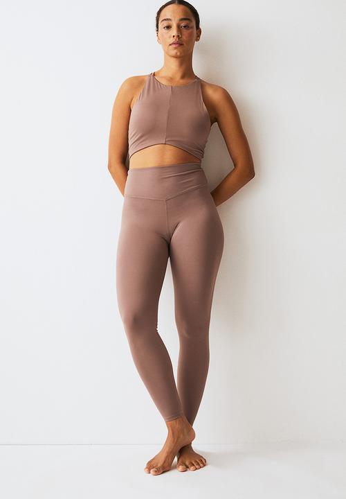 H&M - Softmove™ sports tights - beige