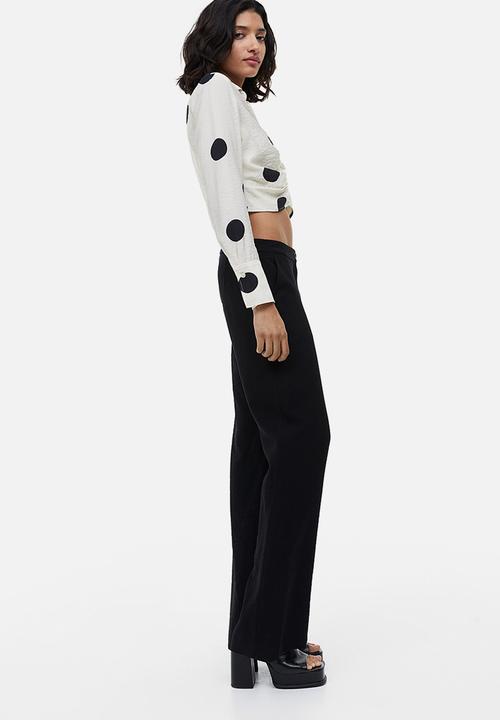 H&M - Flared trousers - black