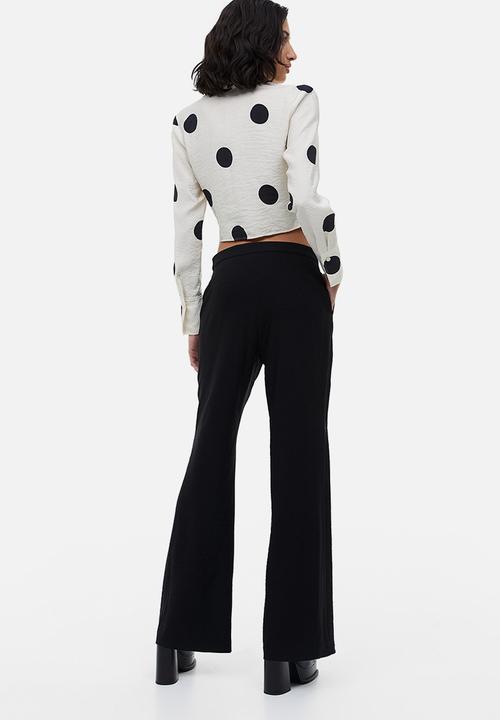 H&M - Flared trousers - black
