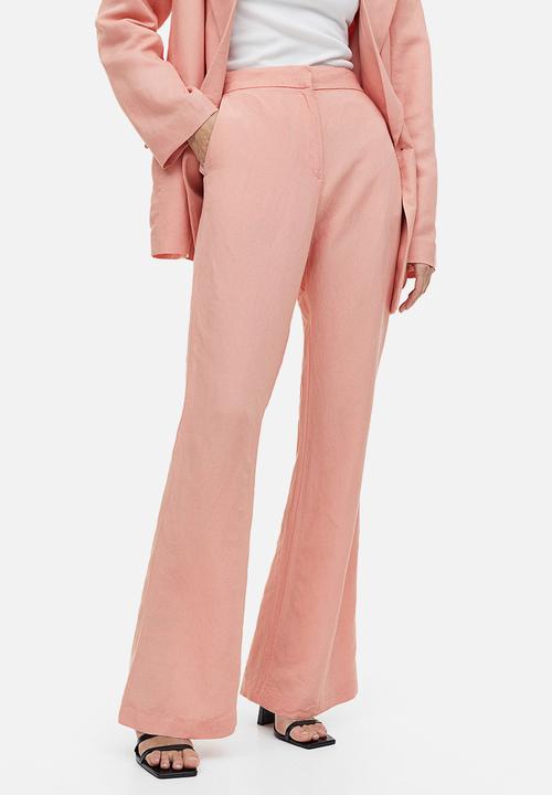 H&M - Flared linen-blend trousers - apricot