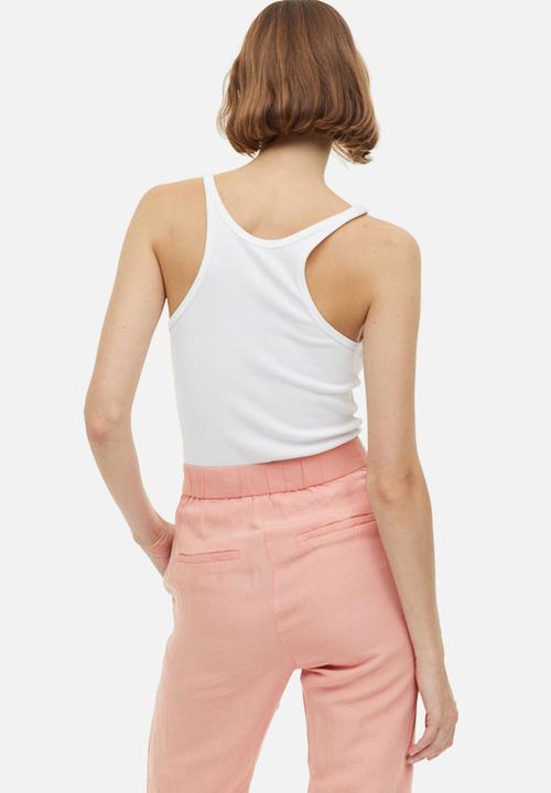 H&M - Flared linen-blend trousers - apricot