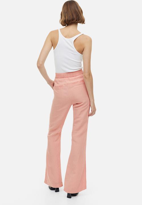 H&M - Flared linen-blend trousers - apricot