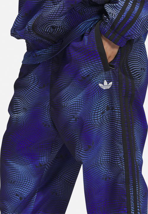 adidas Originals - MV Allover print track pants - blue