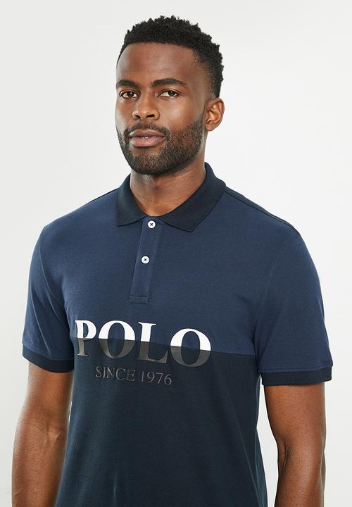 POLO - Mens colour block logo short sleeve golfer - mid blue