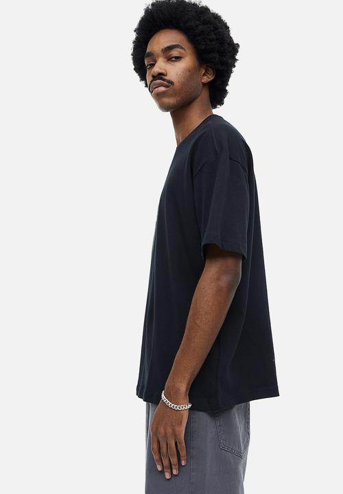 H&M - Relaxed fit printed T-shirt - black phone 