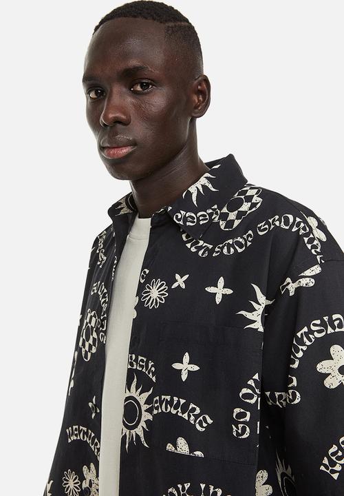 H&M - Relaxed fit short-sleeved cotton shirt - black patterned