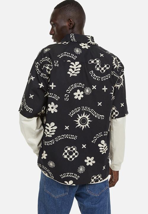 H&M - Relaxed fit short-sleeved cotton shirt - black patterned