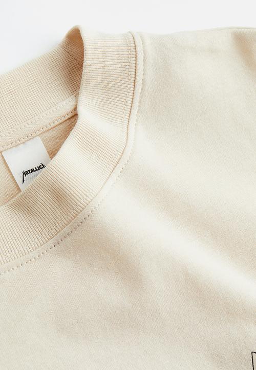 H&M - Oversized printed t-shirt - light beige metallica 