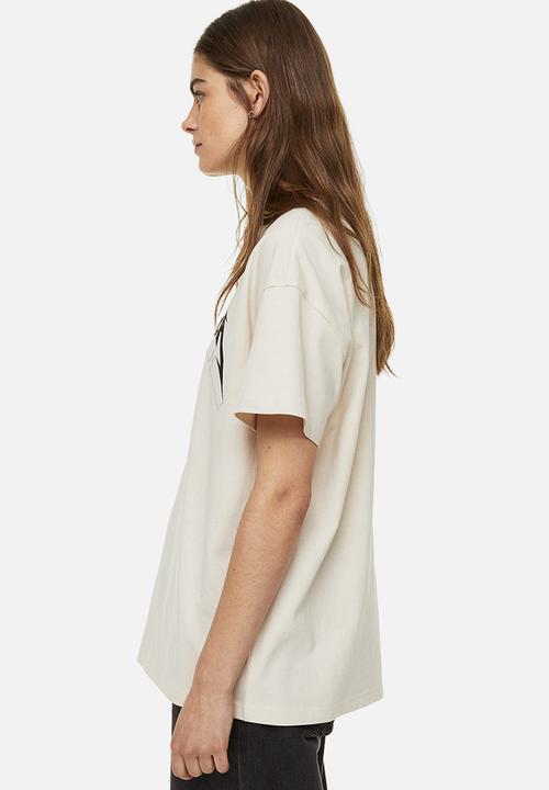 H&M - Oversized printed t-shirt - light beige metallica 