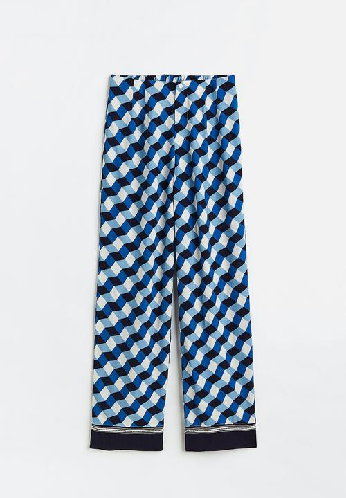 H&M - Wide patterned trousers - bright blue / patterned 