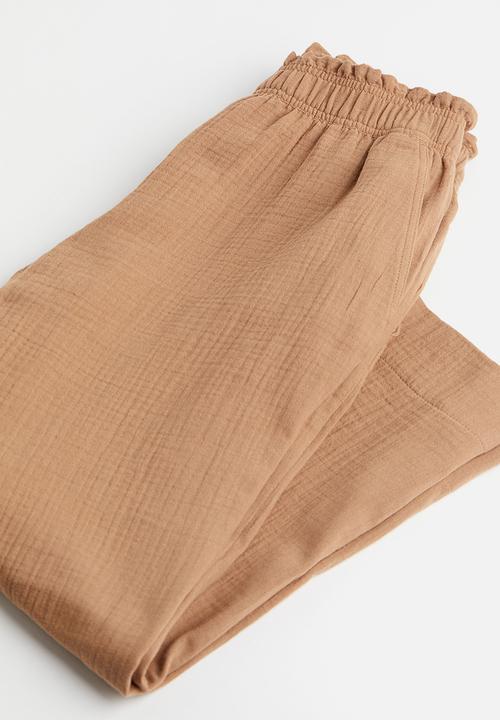 H&M - Crinkled cotton trousers -  dark beige 