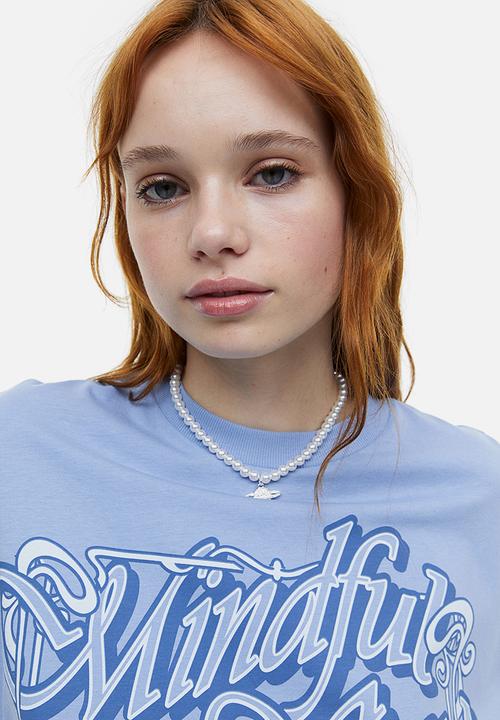 H&M - Oversized printed T-shirt - light blue mindful soul