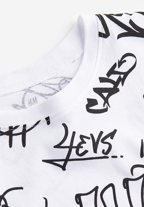 H&M - Printed cotton t-shirt - white / scribble 