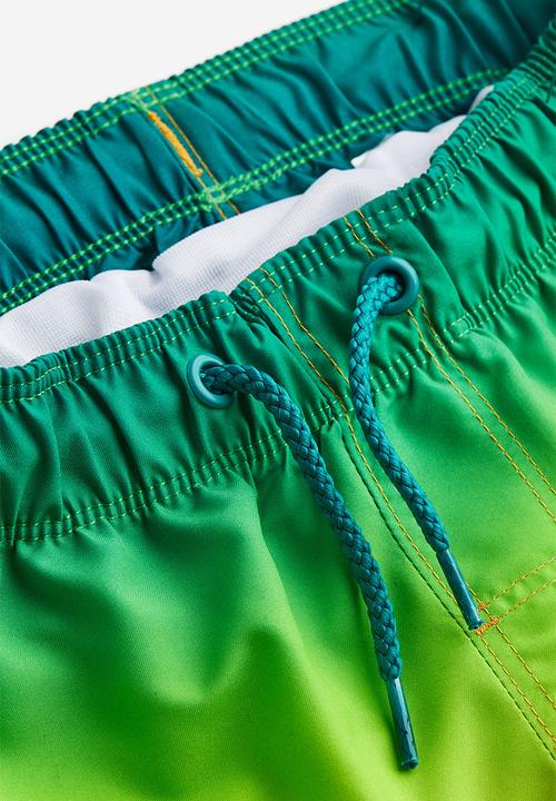 H&M - Patterned swim shorts - green ombre 