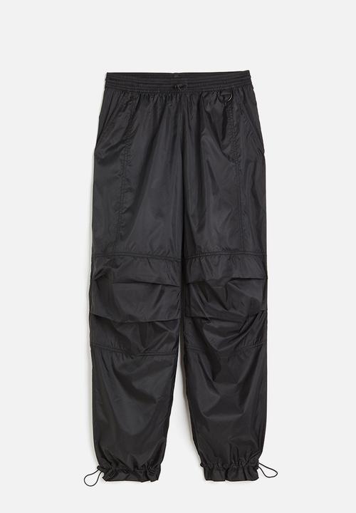H&M - Water-repellent parachute trousers - black