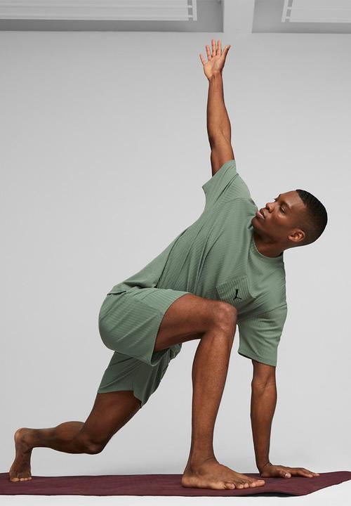 PUMA - M studio unwind 7" knit short - green 