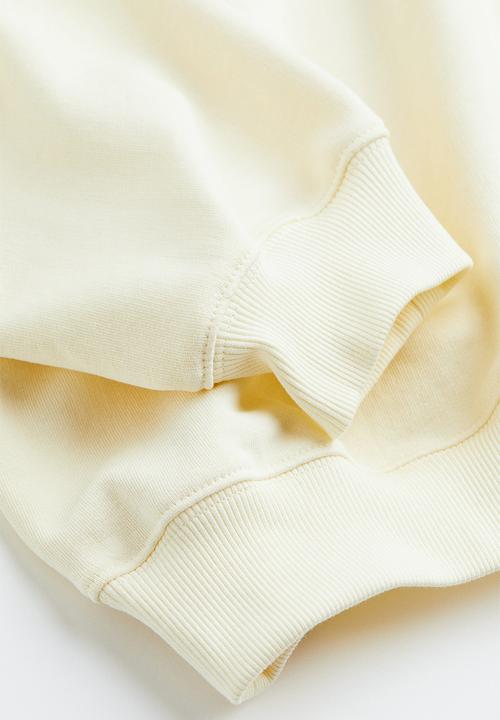 H&M - Drymove™ sports sweatshirt - cream