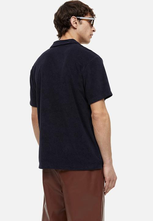 H&M - Regular fit terry polo shirt - navy blue