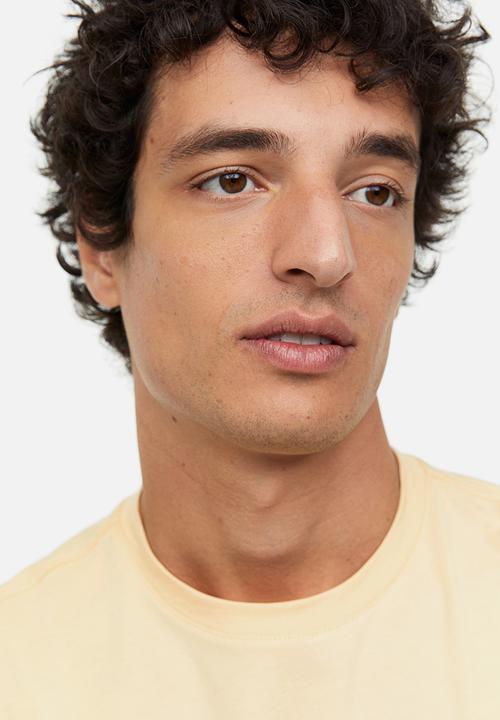 H&M - Regular fit pima cotton t-shirt - pale yellow 