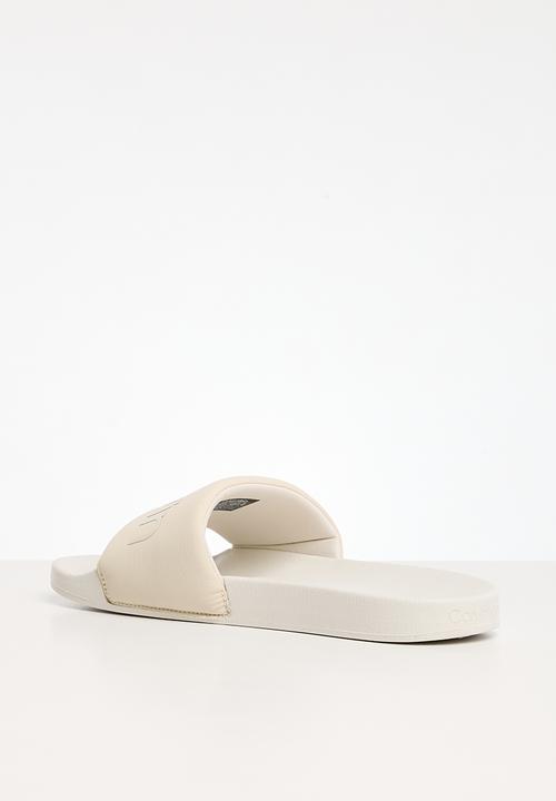 Calvin Klein - Pool slide txt - dark ecru