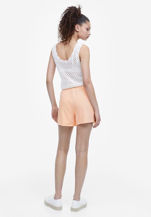 H&M - Sweatshorts - apricot pacific sun