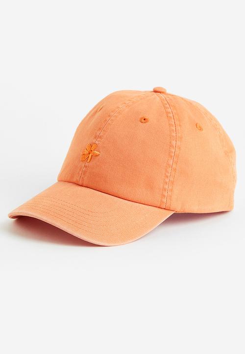 H&M - Embroidered motif cotton cap - pale orange flower