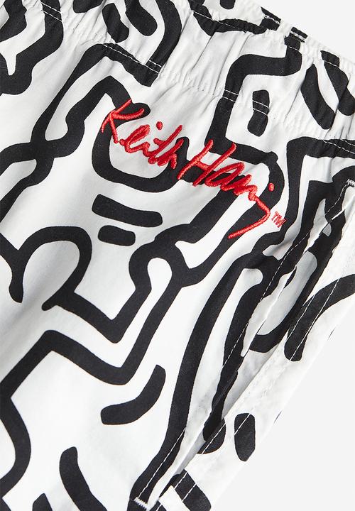 H&M - Relaxed fit patterned cotton trousers - white & black