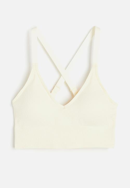 H&M - Drymove™ medium support sports bra - cream 