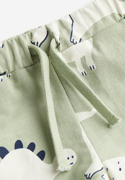 H&M - Jersey shorts - light green dinosaurs