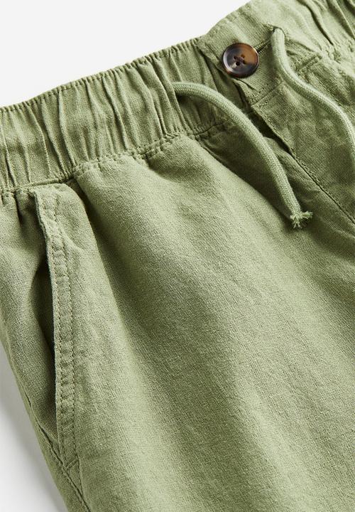 H&M - Loose fit linen blend trousers - light khaki green