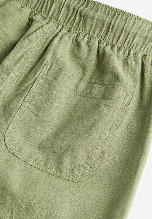 H&M - Loose fit linen blend trousers - light khaki green