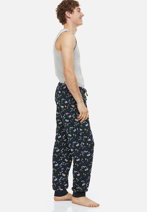 H&M - Regular fit pyjama bottoms - dark blue & looney tunes 