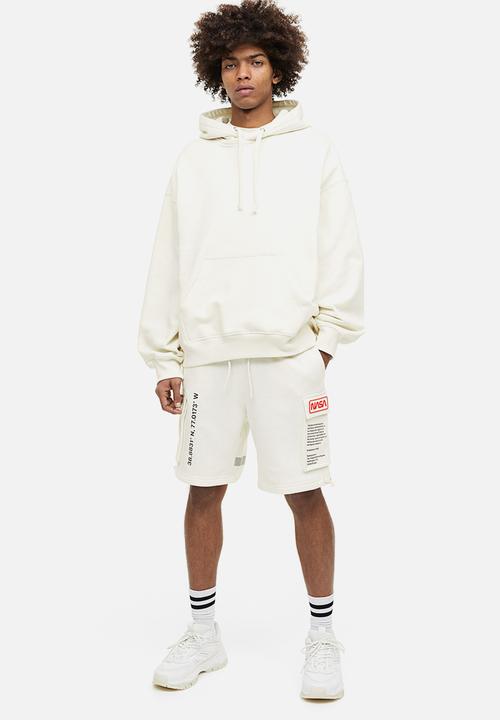 H&M - Printed sweatshirt shorts - cream nasa
