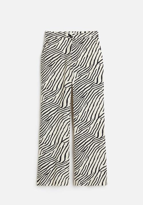 H&M - Flared trousers - white multi