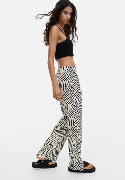 H&M - Flared trousers - white multi