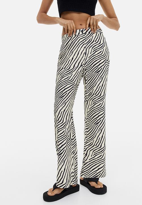 H&M - Flared trousers - white multi